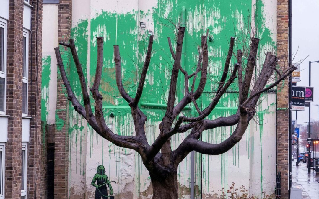 Banksy’s New Tree Mural Dramatically ‘Greenwashes’ the Side of a London Building